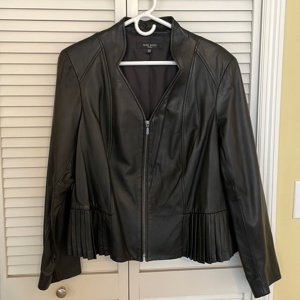 Nine West Woman shapely leather jacket with zipper and accents.
